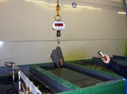 Usage des balances  crochet dans une installation de galvanisation.